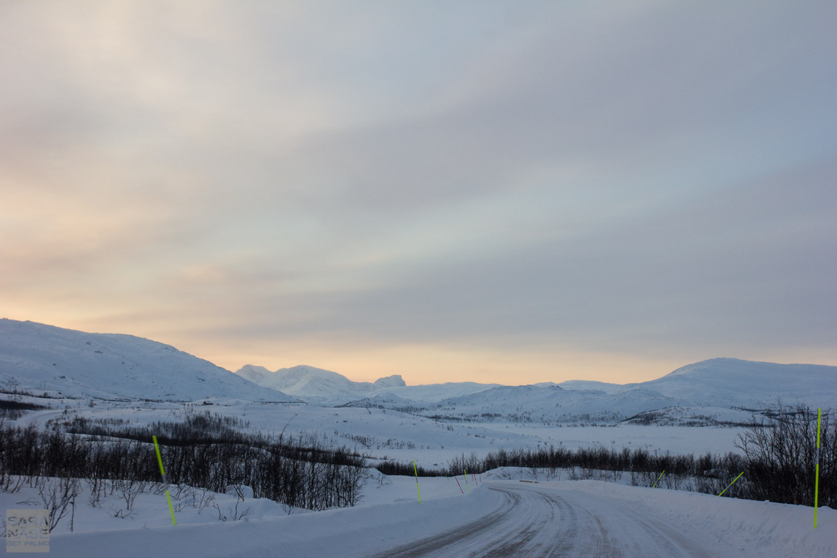 Lapland sunset winter road