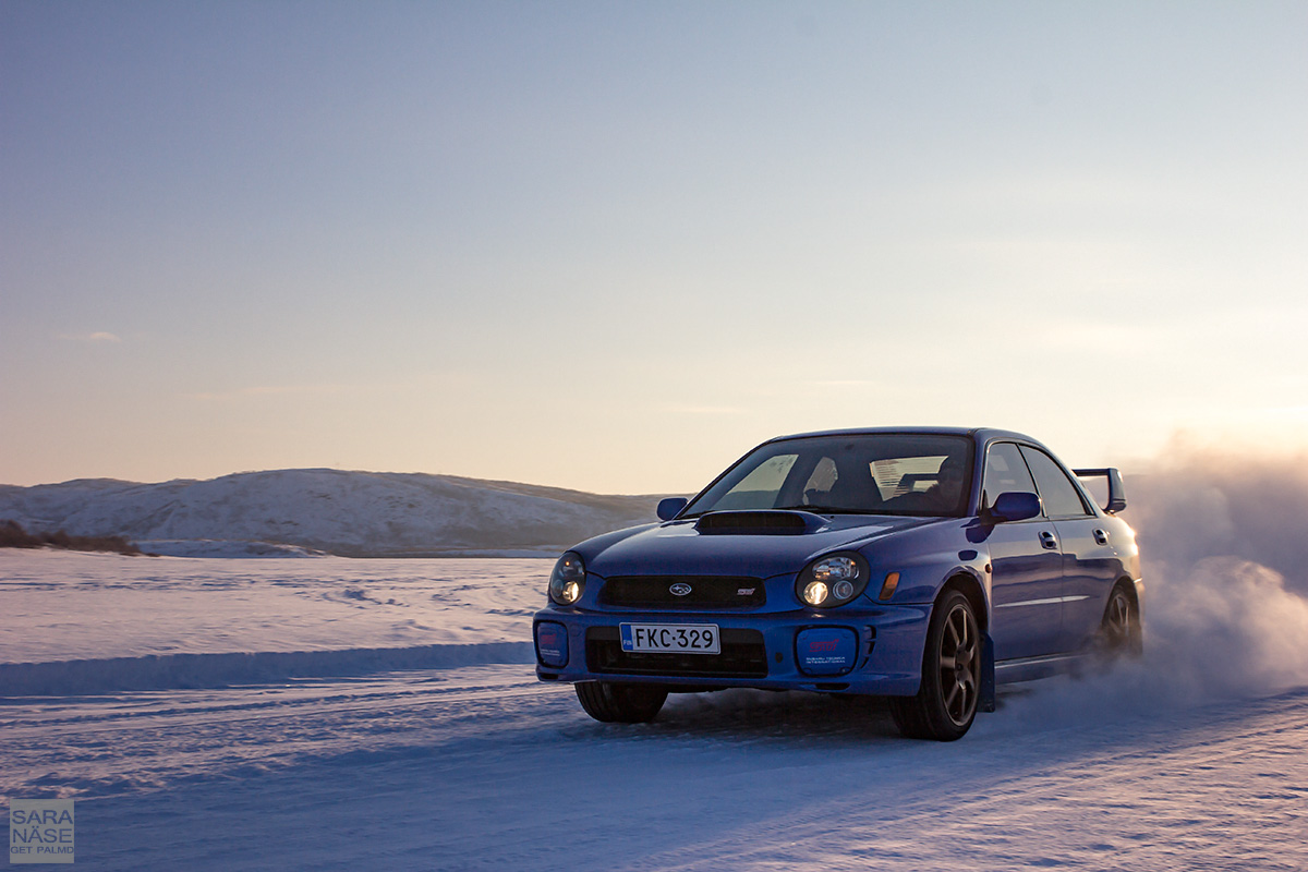 Blue Subaru Impreza drifting