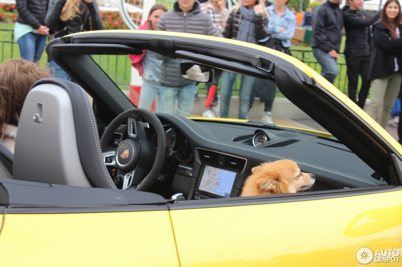 Top Marques Monaco 2017 - Racing yellow Porsche 911 Carrera 4 GTS Cabriolet and dog