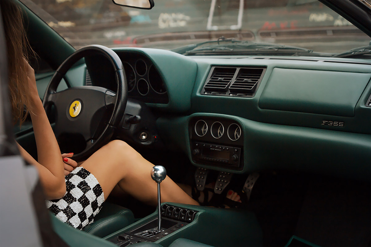 Ferrari F355 berlinetta and girl Sara Norris / getpalmd sitting in the car