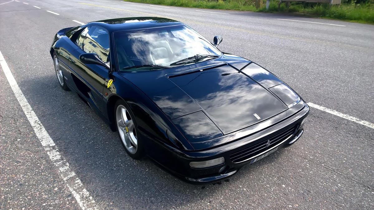 Ferrari F355 berlinetta black with silver wheels